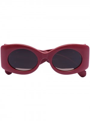 Солнцезащитные очки в овальной оправе Gucci Eyewear. Цвет: красный