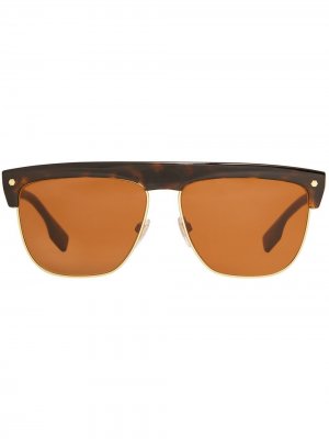 Солнцезащитные очки в полуободковой оправе Burberry. Цвет: коричневый