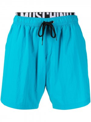 Плавки-шорты с логотипом Moschino. Цвет: синий