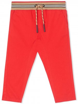 Спортивные брюки в полоску Icon Stripe Burberry Kids. Цвет: красный
