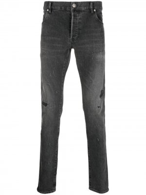 Узкие джинсы с эффектом потертости Balmain. Цвет: черный
