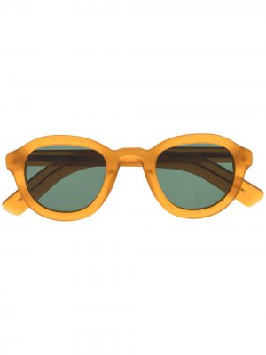 Солнцезащитные очки в круглой оправе с затемненными линзами Lesca. Цвет: оранжевый