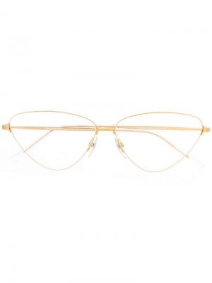 Солнцезащитные очки в треугольной оправе Balenciaga Eyewear. Цвет: золотистый
