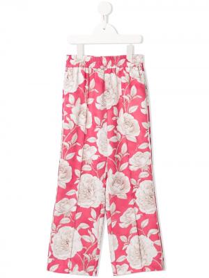 Широкие брюки с цветочным принтом Monnalisa. Цвет: разноцветный