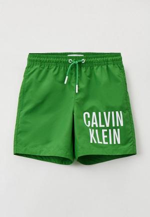 Плавки Calvin Klein. Цвет: зеленый
