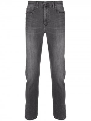 Узкие джинсы с эффектом потертости Diesel. Цвет: серый